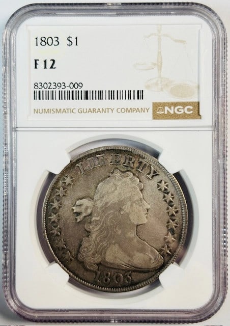 Draped Bust 1803 Small 3 Silver Dollar NGC F12 Certified: Draped Bust 1803 Small 3 Silver Dollar NGC F12 Certified This 1803 Draped Bust Silver Dollar features the Small 3 variety and has been certified by NGC with a grade of F 12. Struck in silver, this cir