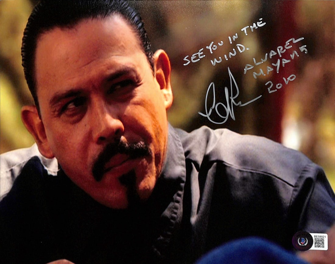 Emilio Rivera Signed 8x10 Sons of Anarchy Photo with Inscription Beckett Certified: Emilio Rivera Signed 8x10 Sons of Anarchy Photo with Inscription Beckett Certified This is an autographed 8x10 photograph of Emilio Rivera, best known for his role as "Marcus Alvarez" in the acclaimed
