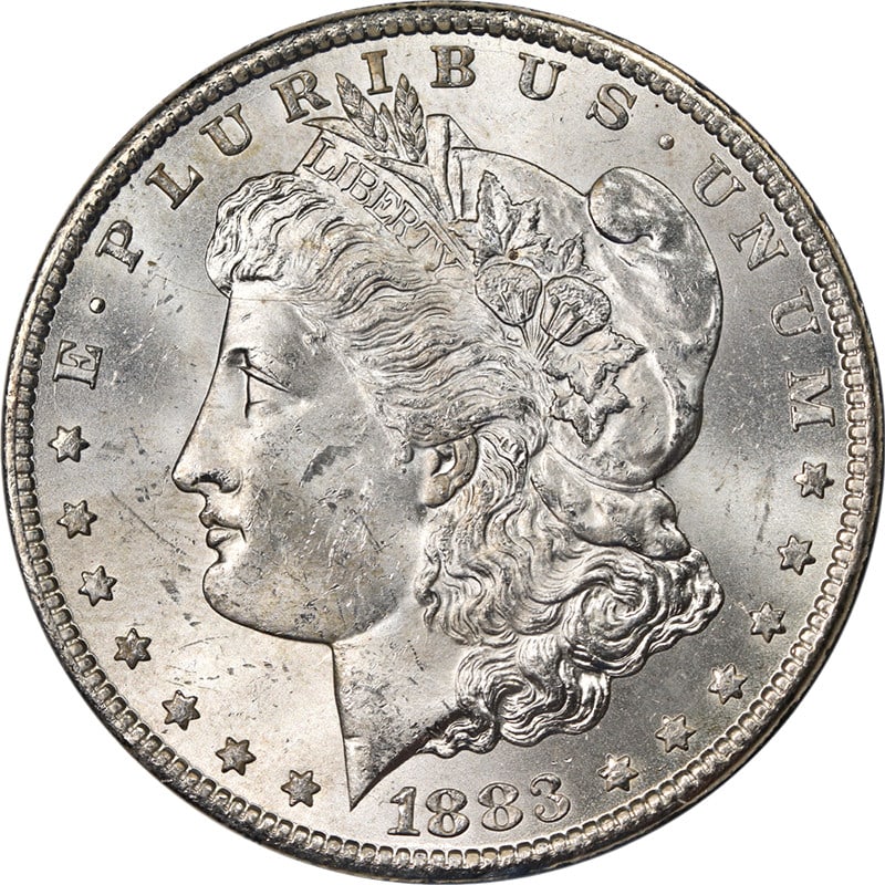 1883-CC GSA Morgan Silver Dollar NGC MS63 Uncirculated Blast White: 1883-CC GSA Morgan Silver Dollar NGC MS63 Uncirculated Blast White This stunning 1883-CC GSA Morgan Silver Dollar is certified by NGC with a grade of MS63, showcasing impressive luster and a brilliant