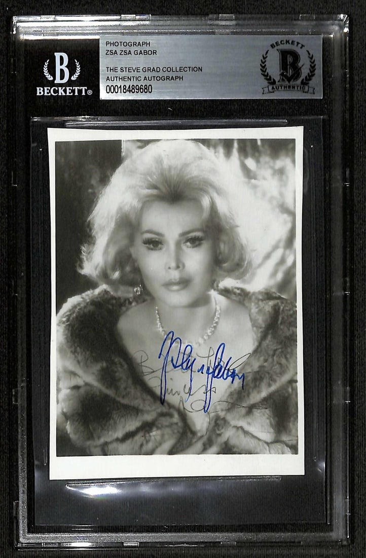 Zsa Zsa Gabor 5x7 Signed Photo with BECKETT Authentication: Zsa Zsa Gabor 5x7 Signed Photo with BECKETT Authentication This stunning 5x7 black and white vintage photograph captures Hollywood icon Zsa Zsa Gabor (1917-2016), showcasing her elegance and timeless 