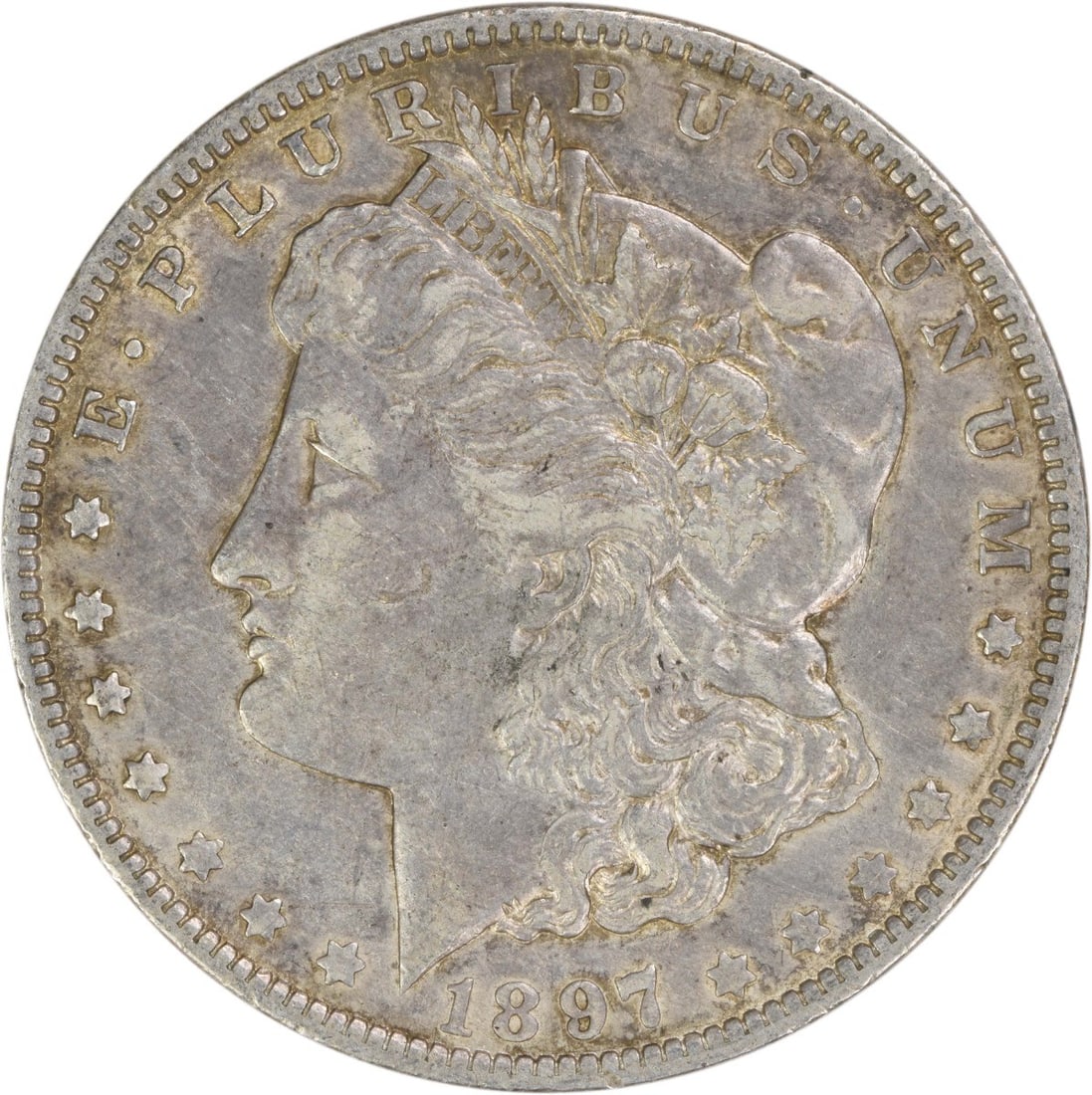 1897-O Morgan Dollar Extra Fine Uncertified US Silver Coin: 1897-O Morgan Dollar Extra Fine Uncertified US Silver Coin This is an 1897-O Morgan Silver Dollar from the New Orleans Mint. Composed of 90% silver and 10% copper, this circulated coin features the de
