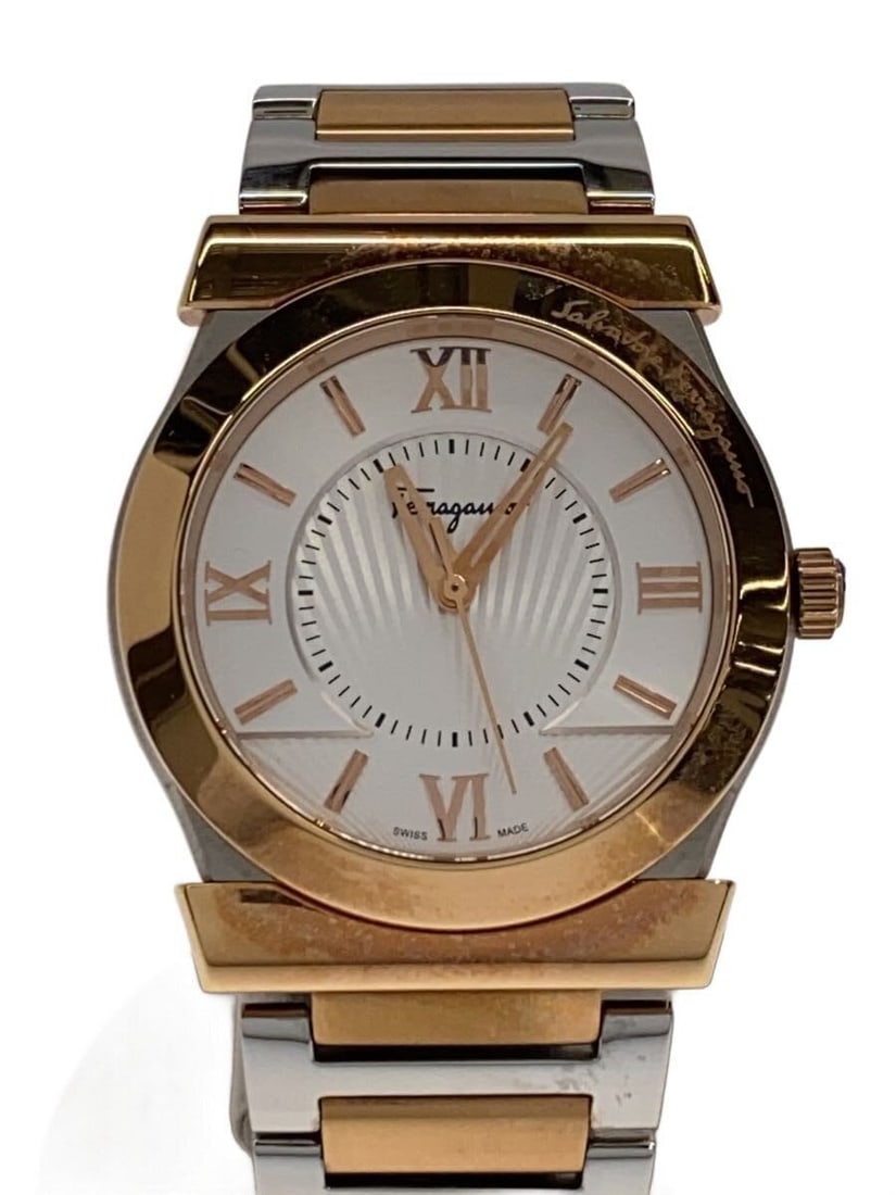 Salvatore Ferragamo Vega quartz ladies wristwatch FIQ030016: Salvatore Ferragamo Vega quartz ladies wristwatch FIQ030016 This Salvatore Ferragamo VEGA Series women's quartz wristwatch features a sleek Swiss-made design. The watch shows slight signs of use, with