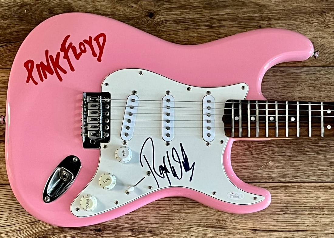 Roger Waters Signed Pink Floyd Custom Electric Guitar JSA Certified: Roger Waters Signed Pink Floyd Custom Electric Guitar JSA Certified This custom-designed electric guitar features a striking pink finish and is signed by Roger Waters, the legendary co-founder of the 