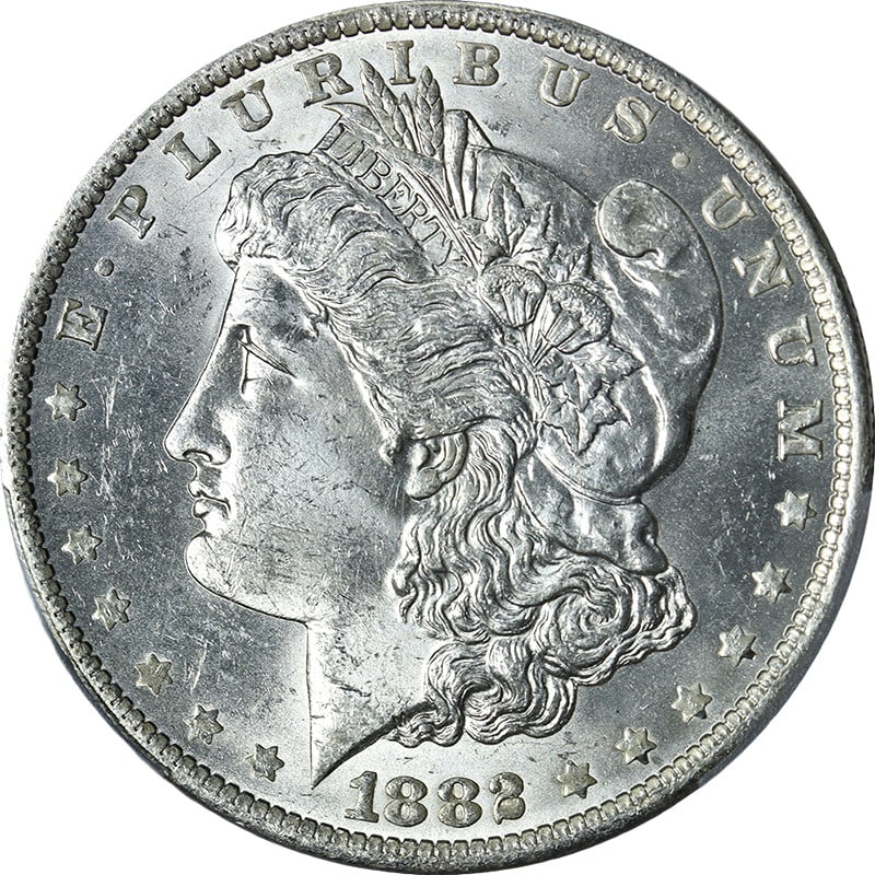 PCGS MS63 1882-O Morgan Dollar Uncirculated Silver Coin: PCGS MS63 1882-O Morgan Dollar Uncirculated Silver Coin This original 1882-O Morgan Silver Dollar is graded MS63 by PCGS and features a bright, lustrous appearance with a well-defined strike. The coin