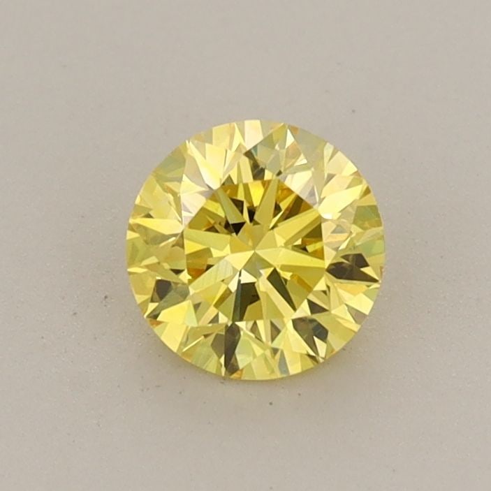 Loose Diamond - ROUND 0.5ct Fancy Vivid Yellow VS1: Loose Diamond - ROUND 0.5ct Fancy Vivid Yellow VS1 Source: This is a real non-mined Diamond that has been grown in a lab Shape: ROUND Carats: 0.5 Color: Fancy Vivid Yellow Certification: IGI Video: