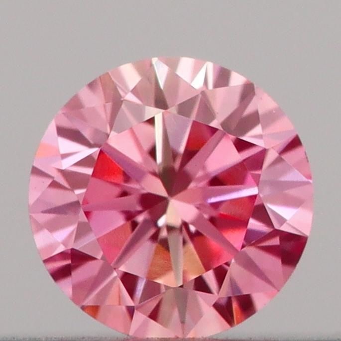 Loose Diamond - ROUND 0.18ct Fancy Vivid Pink VVS2: Loose Diamond - ROUND 0.18ct Fancy Vivid Pink VVS2 Source: This is a real non-mined Diamond that has been grown in a lab Shape: ROUND Carats: 0.18 Color: Fancy Vivid Pink Certification: IGI Video: