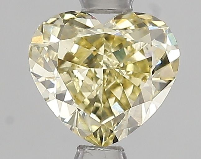 Loose Diamond - HEART 1.5ct Fancy Yellow VS2: Loose Diamond - HEART 1.5ct Fancy Yellow VS2 Source: This is a real non-mined Diamond that has been grown in a lab Shape: HEART Carats: 1.5 Color: Fancy Yellow Certification: IGI Video: