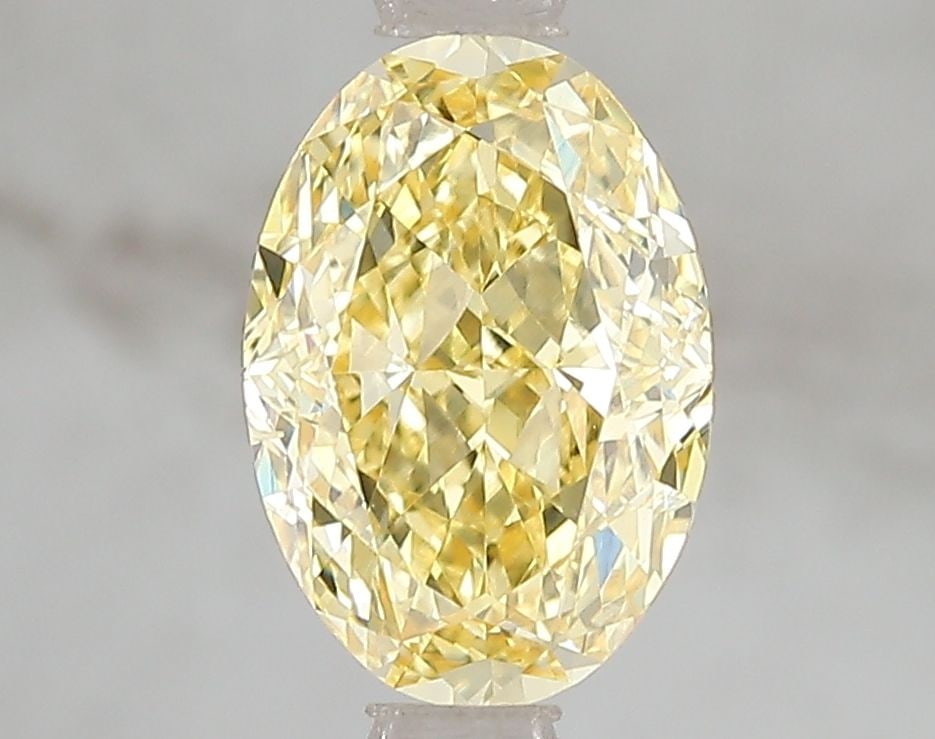 Loose Diamond - OVAL 2.0ct Fancy Vivid Yellow VS2: Loose Diamond - OVAL 2.0ct Fancy Vivid Yellow VS2 Source: This is a real non-mined Diamond that has been grown in a lab Shape: OVAL Carats: 2.0 Color: Fancy Vivid Yellow Certification: IGI Video: