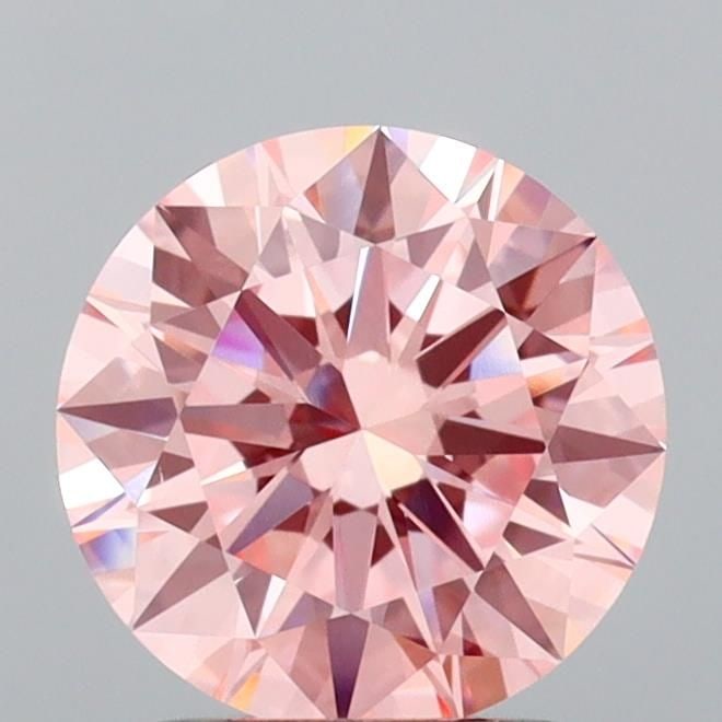 Ideal Loose Diamond - ROUND 2.01ct Fancy Vivid Pink VS1: Ideal Loose Diamond - ROUND 2.01ct Fancy Vivid Pink VS1 Source: This is a real non-mined Diamond that has been grown in a lab Shape: ROUND Carats: 2.01 Color: Fancy Vivid Pink Certification: IGI Video