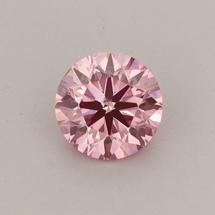 Loose Diamond - ROUND 0.42ct Fancy Vivid Pink VS2: Loose Diamond - ROUND 0.42ct Fancy Vivid Pink VS2 Source: This is a real non-mined Diamond that has been grown in a lab Shape: ROUND Carats: 0.42 Color: Fancy Vivid Pink Certification: IGI Video: