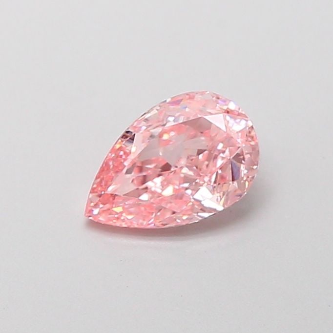 Loose Diamond - PEAR 0.56ct Fancy Vivid Pink VVS2: Loose Diamond - PEAR 0.56ct Fancy Vivid Pink VVS2 Source: This is a real non-mined Diamond that has been grown in a lab Shape: PEAR Carats: 0.56 Color: Fancy Vivid Pink Certification: IGI Video: