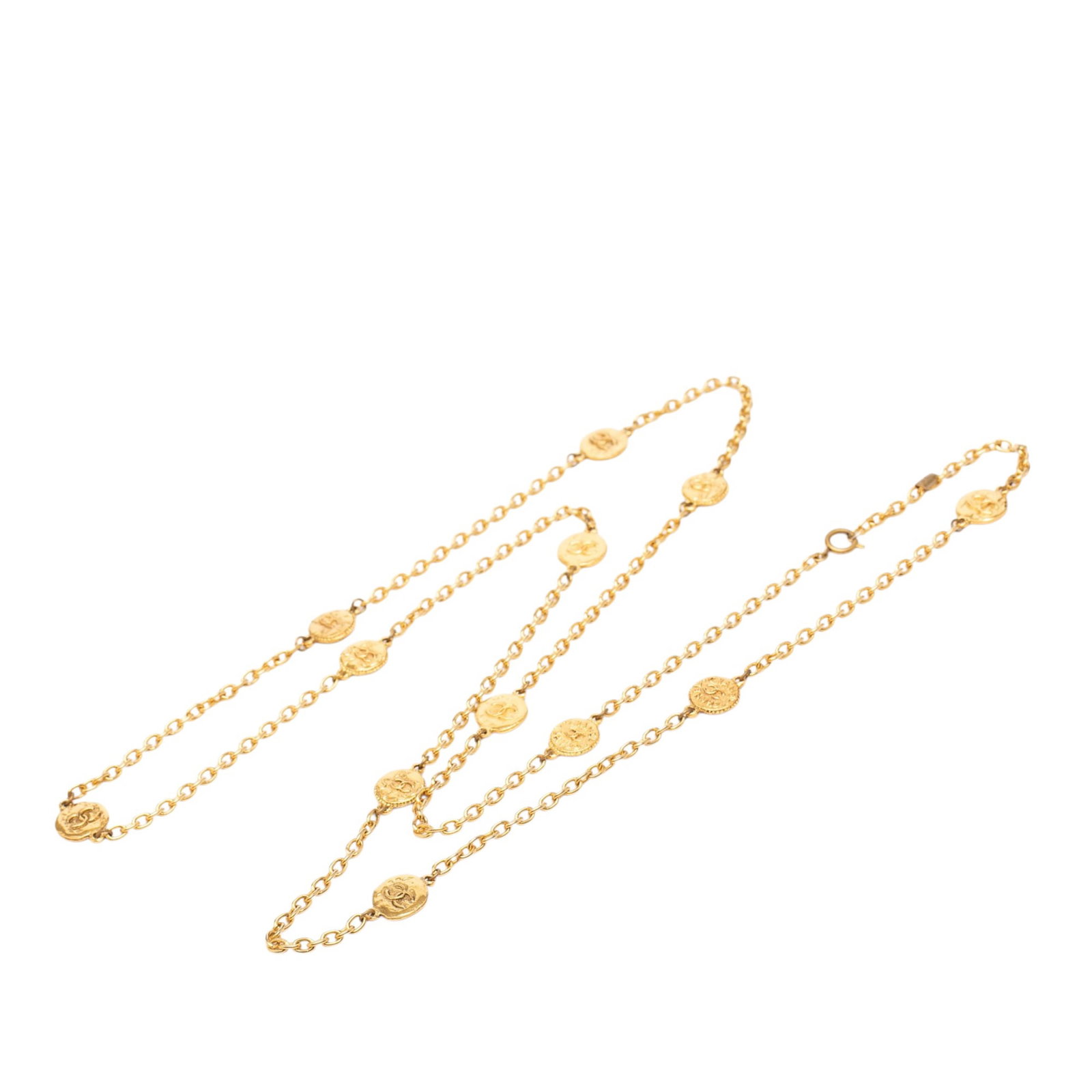 Chanel CC Medallion Station Necklace Gold Tone Metal: Chanel CC Medallion Station Necklace Gold Tone Metal This Chanel CC Gold Plated Medallion Station Necklace features a gold-tone metal construction with a distinctive medallion station design and a spr