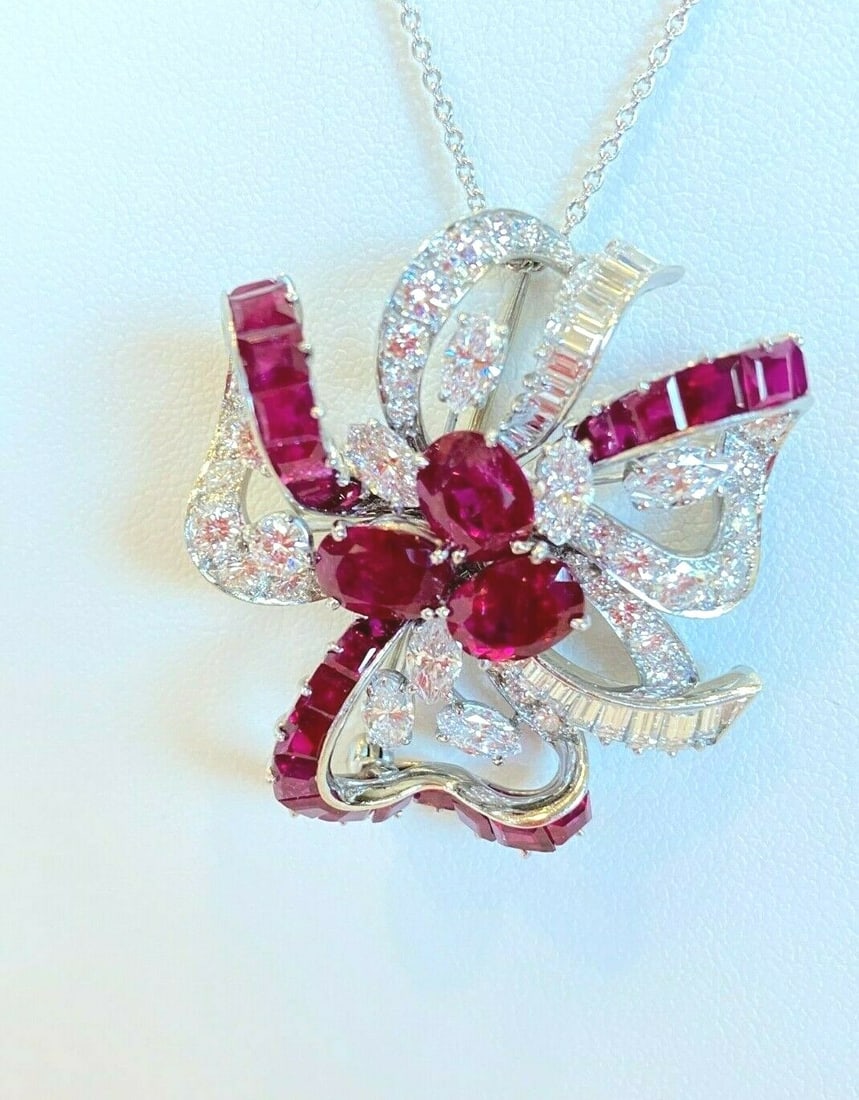 Oscar Heyman 1950 Platinum Ruby Diamond Brooch with Certificate: Oscar Heyman 1950 Platinum Ruby Diamond Brooch with Certificate Discover the elegance of this exquisite Oscar Heyman brooch, crafted in 1950 from 950 platinum. This piece features a stunning combinati