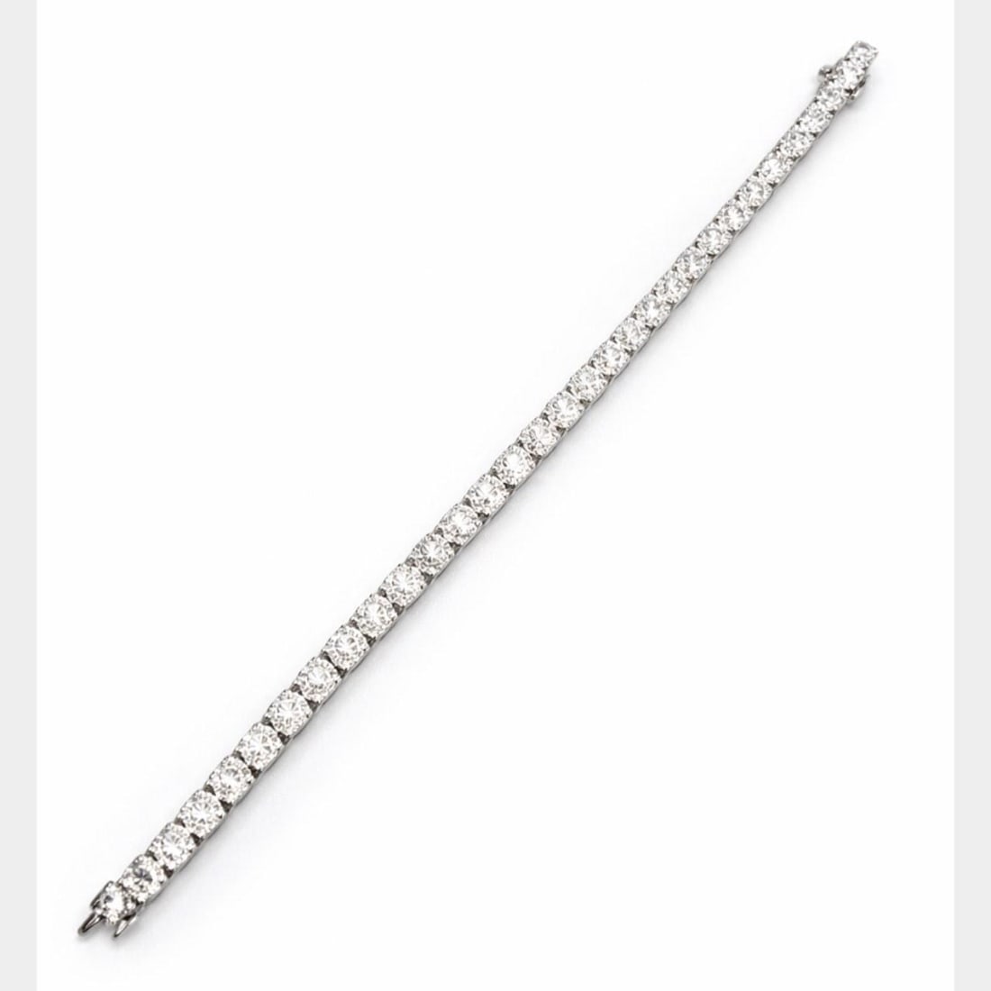 Diamond Tennis Bracelet 8.31 Carat in 18K White Gold 6.75 Inch: Diamond Tennis Bracelet 8.31 Carat in 18K White Gold 6.75 Inch This elegant tennis bracelet is crafted in 18K white gold and features 42 diamonds with a total weight of 8.31 carats. The diamonds are F