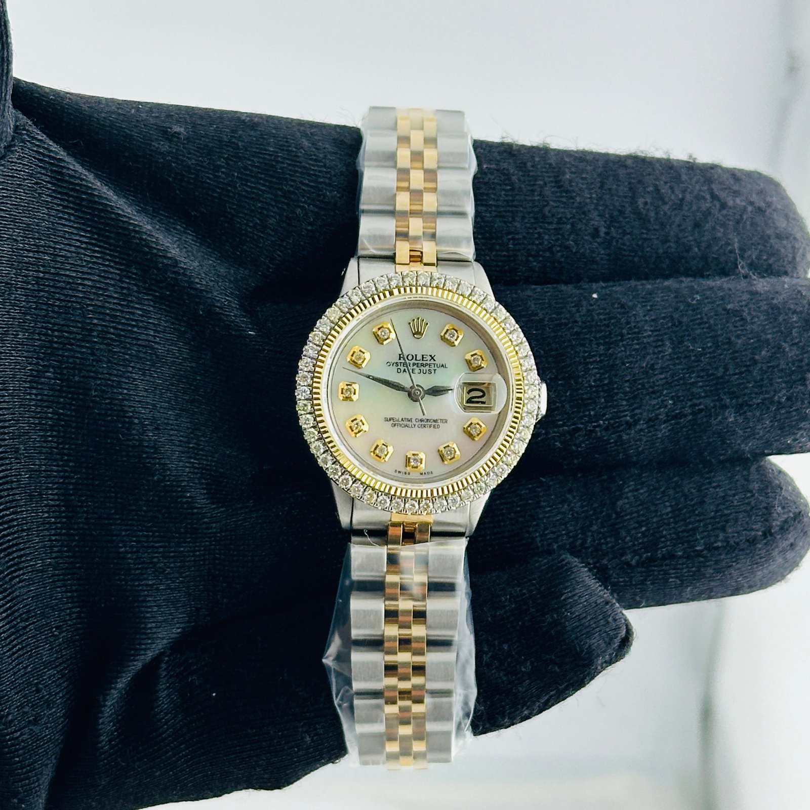 Ladies Rolex Datejust White MOP Dial Yellow Diamond Markers Jubilee Bracelet Ref 6517: Ladies Rolex Datejust White MOP Dial Yellow Diamond Markers Jubilee Bracelet Ref 6517 This ladies' Rolex Datejust features an aftermarket white mother-of-pearl dial with yellow diamond markers, comple
