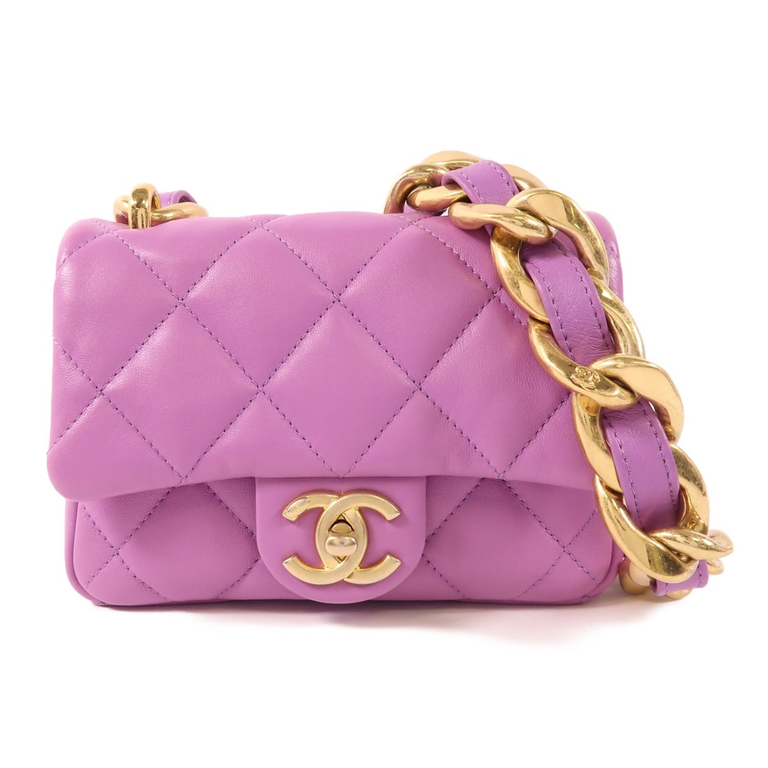 CHANEL Mini Flap Shoulder Bag Purple Lambskin GHW: CHANEL Mini Flap Shoulder Bag Purple Lambskin GHW This CHANEL mini flap shoulder bag is crafted from luxurious purple lambskin leather and features the iconic CC logo. The bag is designed with a gold-