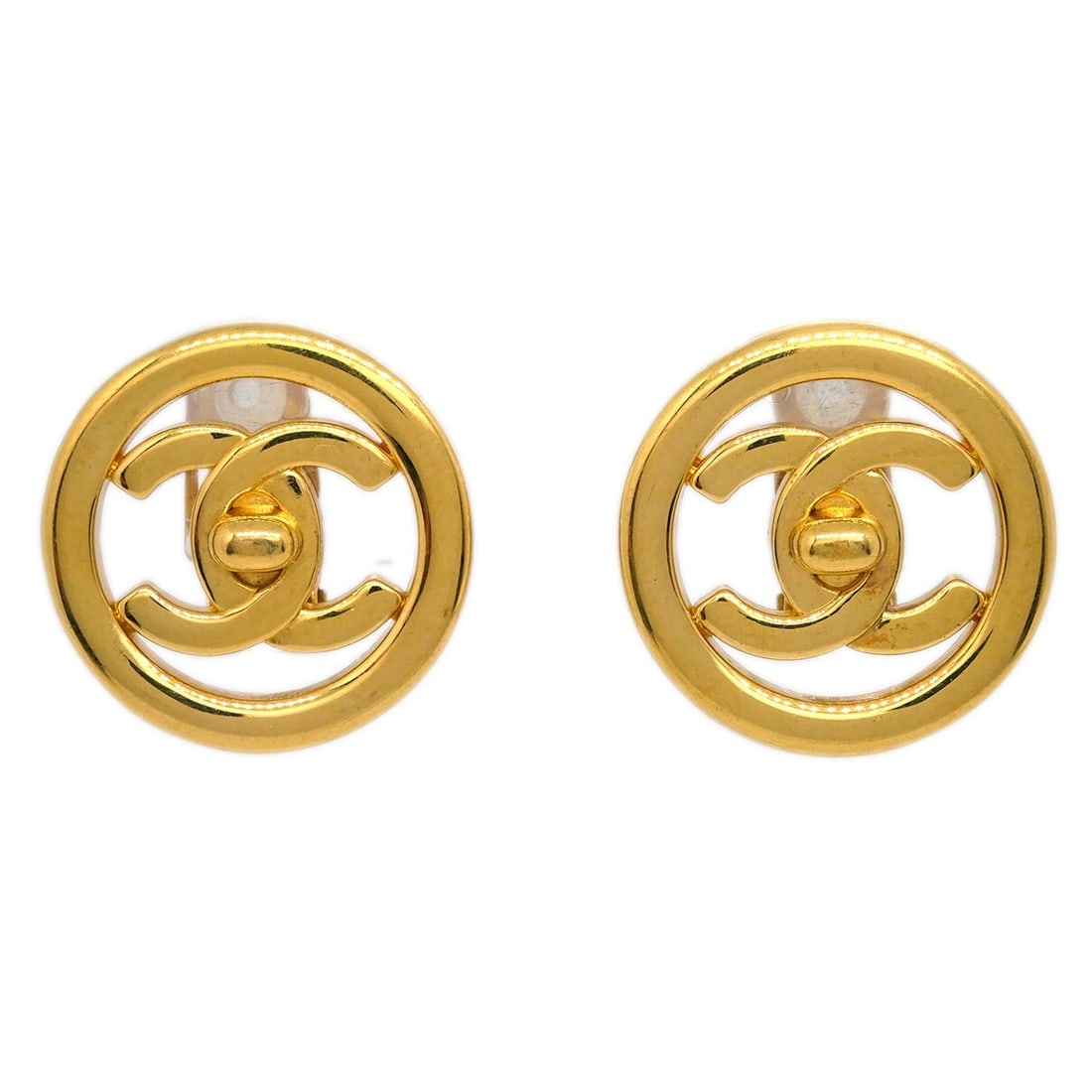 Chanel Gold Clip-On CC Turnlock Button Earrings 97P: Chanel Gold Clip-On CC Turnlock Button Earrings 97P Elevate your accessory collection with these timeless Chanel CC Turnlock Button Earrings. Featuring a classic round shape and a stylish clip-on clos