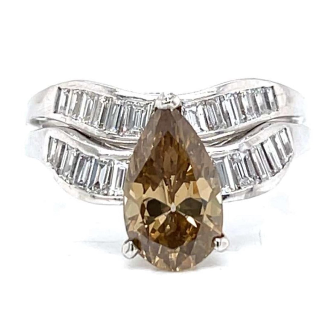 Platinum Art Deco Ring Set with 2.07ct Fancy Yellow Brown Diamond and 24 Accents: Platinum Art Deco Ring Set with 2.07ct Fancy Yellow Brown Diamond and 24 Accents This Art Deco ring set is crafted in platinum and features a 2.07 carat fancy yellow brown diamond with SI2 clarity. It