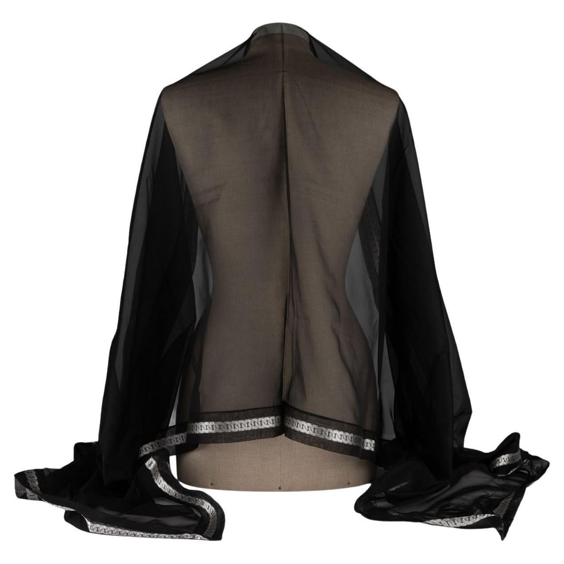 Chanel Black CC Silk Chiffon Shawl with Silver Link Print: Chanel Black CC Silk Chiffon Shawl with Silver Link Print Elevate your evening attire with this exquisite Chanel Black Silk Chiffon Shawl. Crafted in Italy, this luxurious shawl features a striking si