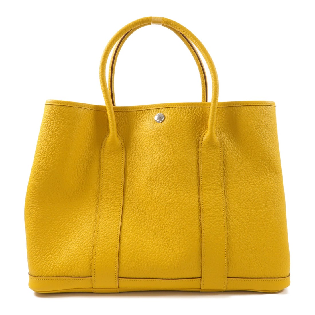 Garden Party PM Yellow Leather Handbag with Palladium by Hermes: Garden Party PM Yellow Leather Handbag with Palladium by Hermes This Hermes Garden Party PM handbag features Negonda leather in a vibrant yellow shade, complemented by palladium hardware. Designed for