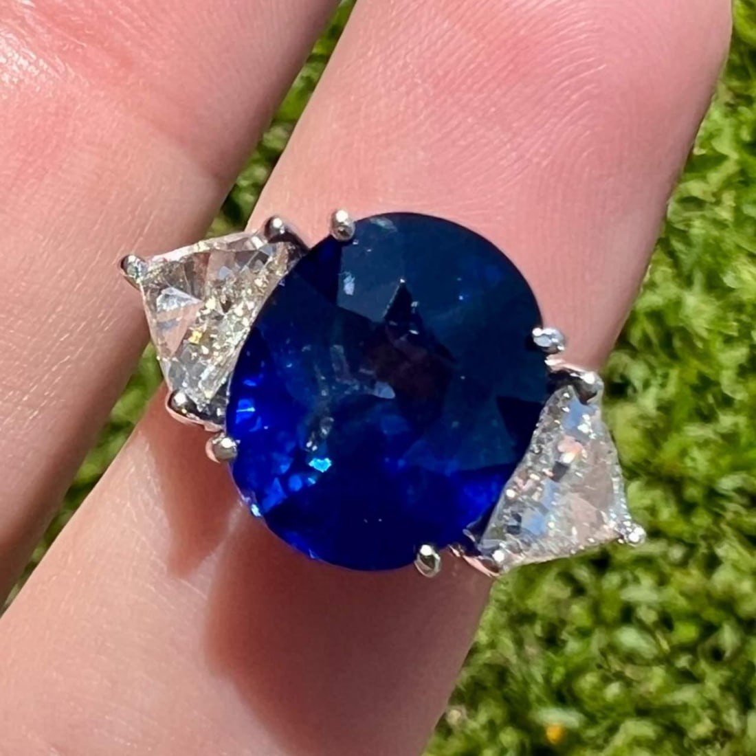 Platinum Ring with 8.18 Ct Ceylon Sapphire and 1.40 Ct Diamonds: Platinum Ring with 8.18 Ct Ceylon Sapphire and 1.40 Ct Diamonds This exquisite ring showcases a stunning 8.18 Ct. heated Ceylon sapphire, beautifully complemented by two trilliant diamonds, totaling a