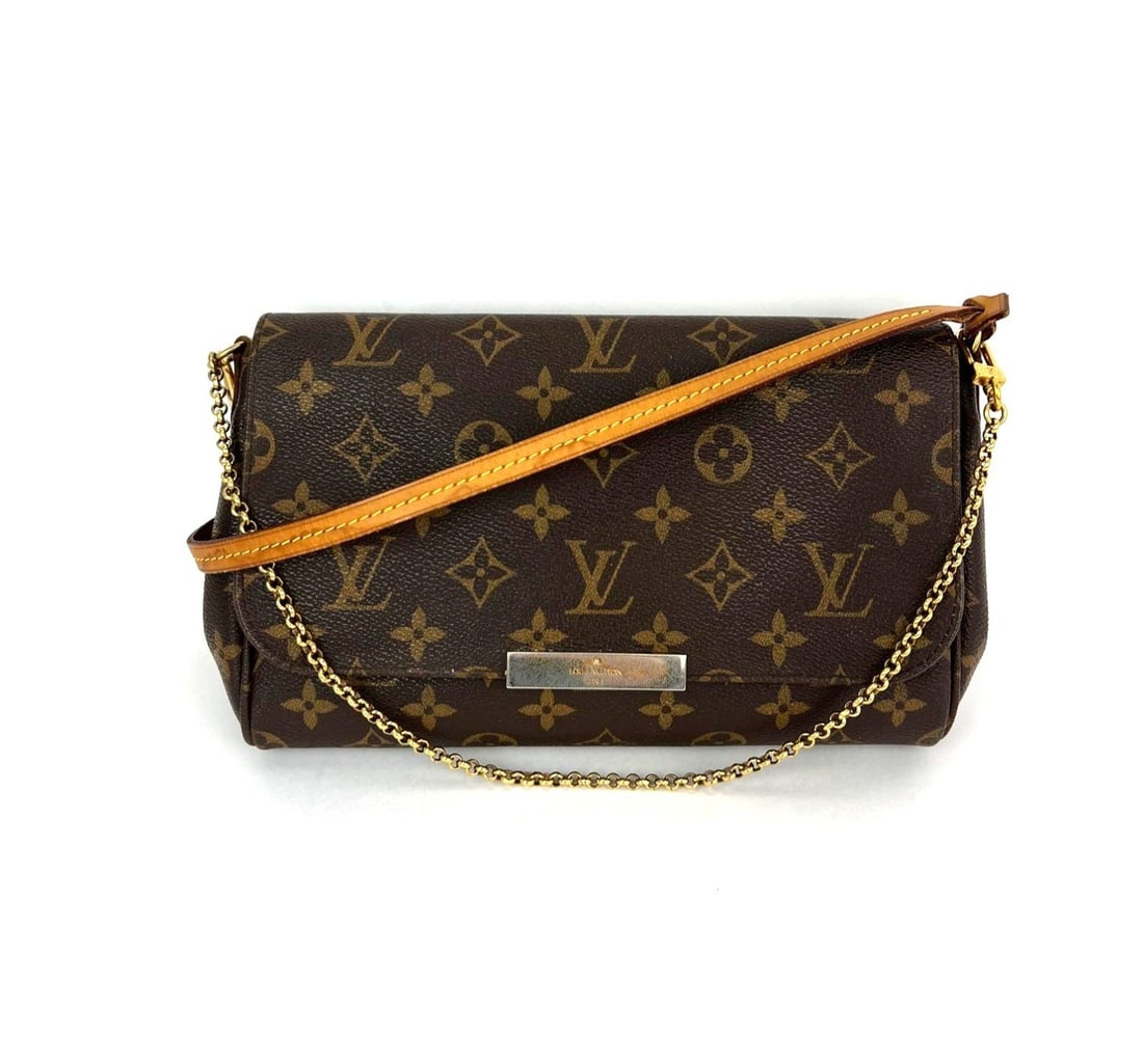 Louis Vuitton Favorite MM Monogram Crossbody Bag: Louis Vuitton Favorite MM Monogram Crossbody Bag This Louis Vuitton Favorite MM Monogram Crossbody Bag features the iconic monogram canvas exterior with a coated finish. It is designed in a rectangula