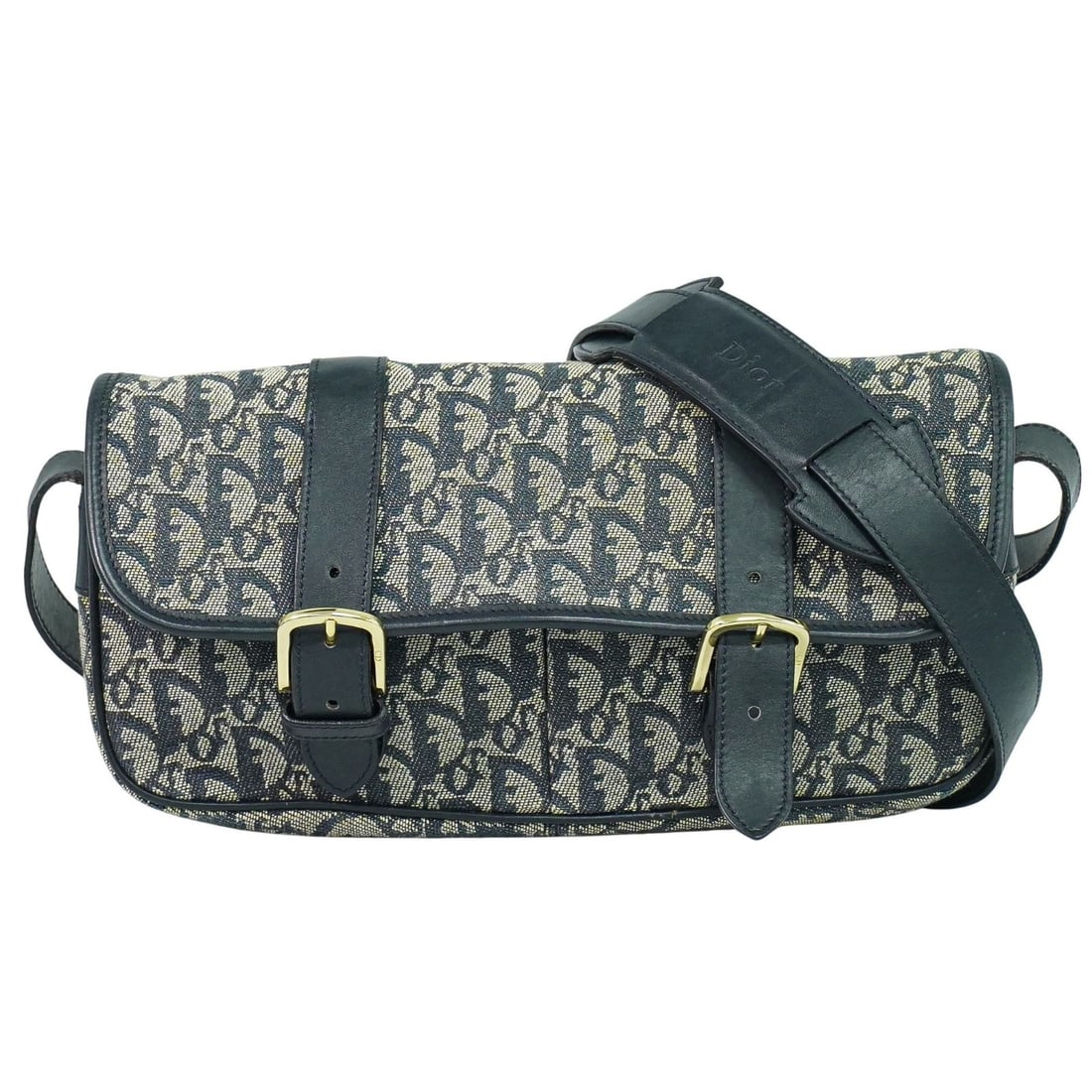 Trotter Canvas Shoulder Bag by Christian Dior in Gray: Trotter Canvas Shoulder Bag by Christian Dior in Gray This Christian Dior Trotter shoulder bag is crafted from gray canvas and designed for women. Made in Italy, it features notable signs of use, incl