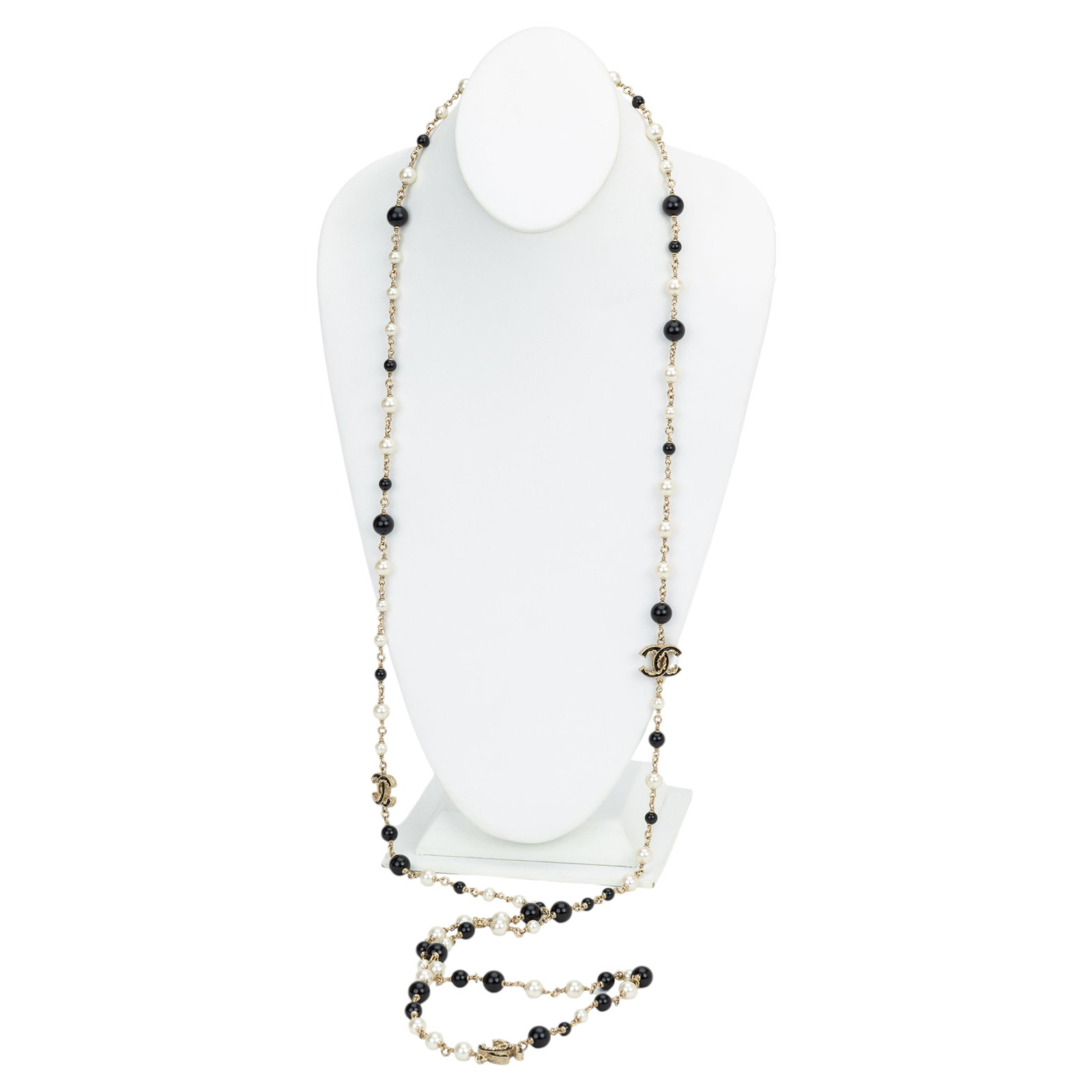 Chanel Pearl and Crystal Bead Necklace with CC Logo Accent: Chanel Pearl and Crystal Bead Necklace with CC Logo Accent This Chanel CC necklace features an elegant combination of crystals, glass pearls, and resin beads, highlighted by gold-tone metal accents. T