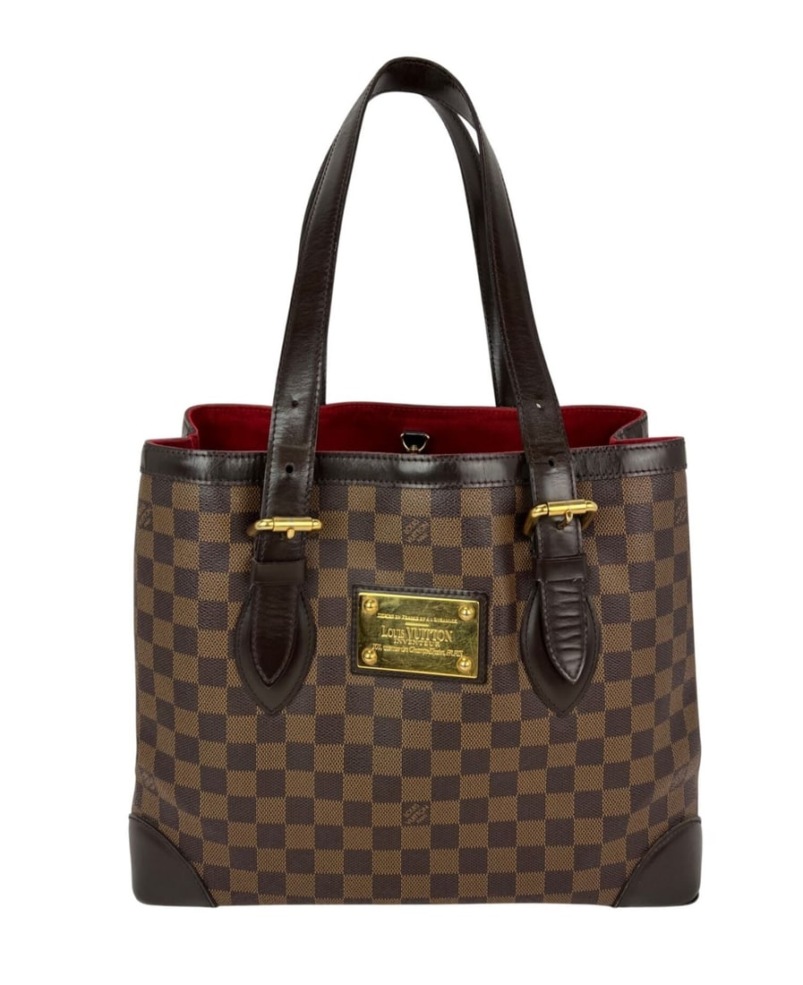 Louis Vuitton Hampstead MM Damier Ebene shoulder tote bag: Louis Vuitton Hampstead MM Damier Ebene shoulder tote bag This Louis Vuitton Hampstead MM is a medium-sized shoulder tote crafted in the iconic Damier Ebene canvas. The bag features a square shape, br