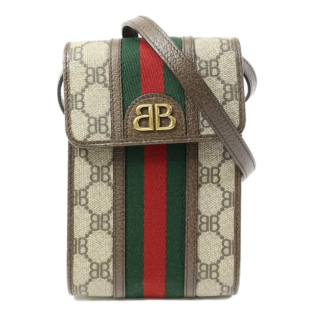 Balenciaga Gucci Collaboration Brown Coated Canvas Shoulder Bag with Gold Hardware: Balenciaga Gucci Collaboration Brown Coated Canvas Shoulder Bag with Gold Hardware This Balenciaga shoulder bag is crafted from brown PVC coated canvas and features gold tone hardware. Designed for un