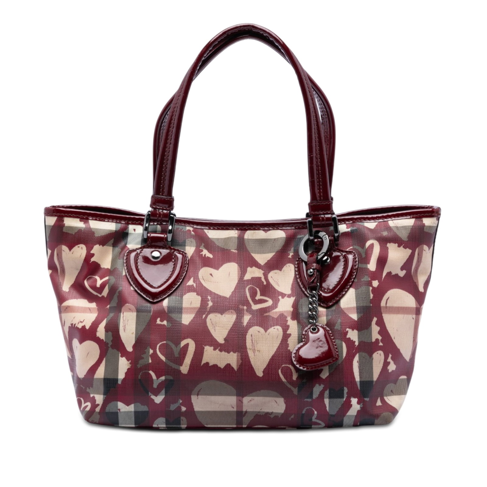 Burberry Hearts Gracie coated canvas tote bag: Burberry Hearts Gracie coated canvas tote bag This Burberry House Check Gracie Tote features a coated canvas body accented with heart motifs and patent leather trim. The design includes flat leather s