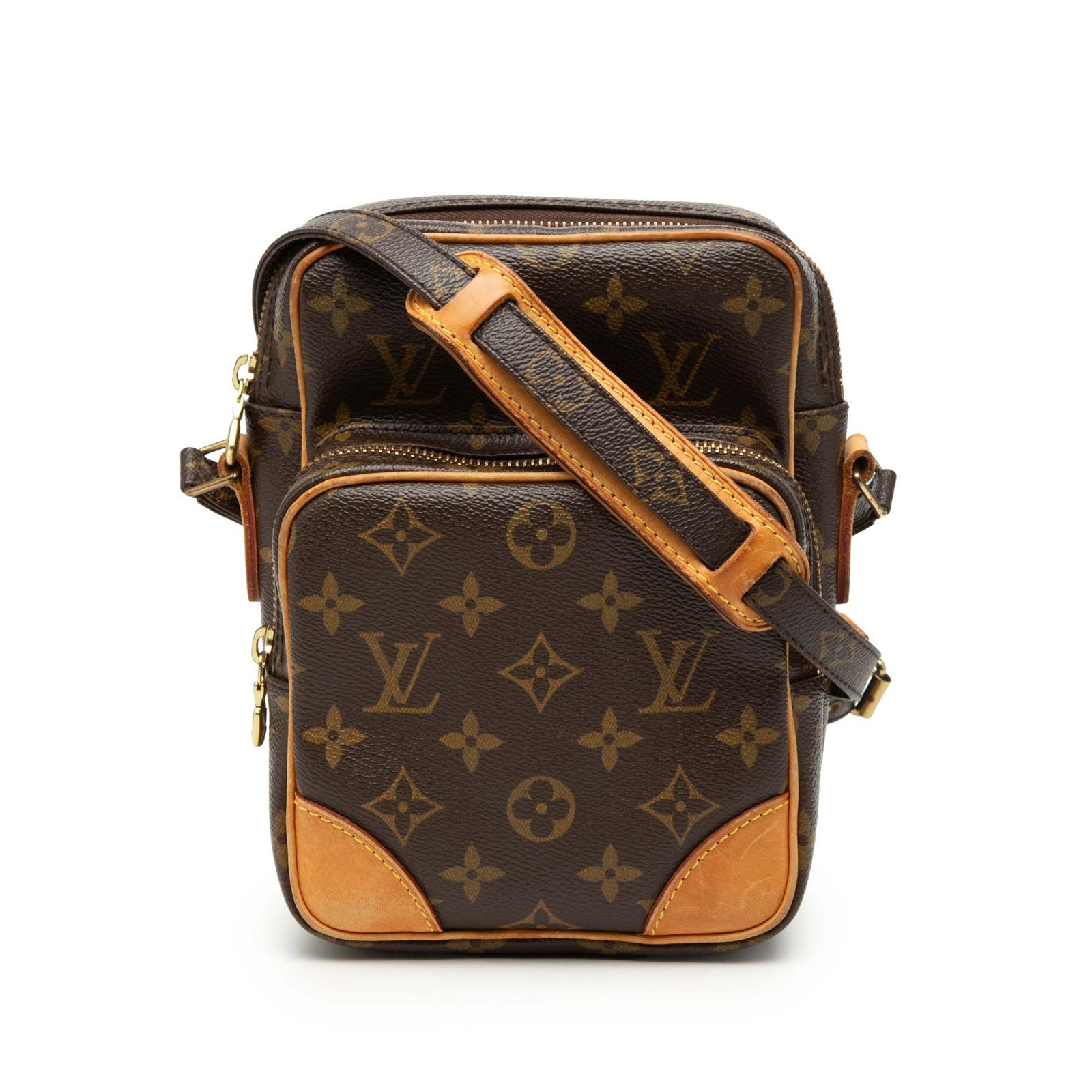 Monogram Amazone Louis Vuitton canvas crossbody bag: Monogram Amazone Louis Vuitton canvas crossbody bag This Louis Vuitton Monogram Amazone bag features the iconic monogram canvas with vachetta leather trim. It offers an adjustable flat strap, a top zi