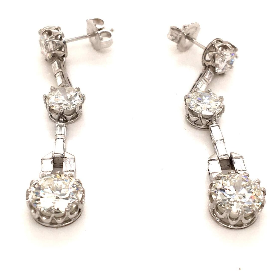 Stunning 8.70 Ct Diamond Earrings in Platinum: Stunning 8.70 Ct Diamond Earrings in Platinum Elevate your elegance with these stunning 8.70 Ct Diamond Earrings, crafted from luxurious platinum. These earrings feature an exquisite arrangement of di