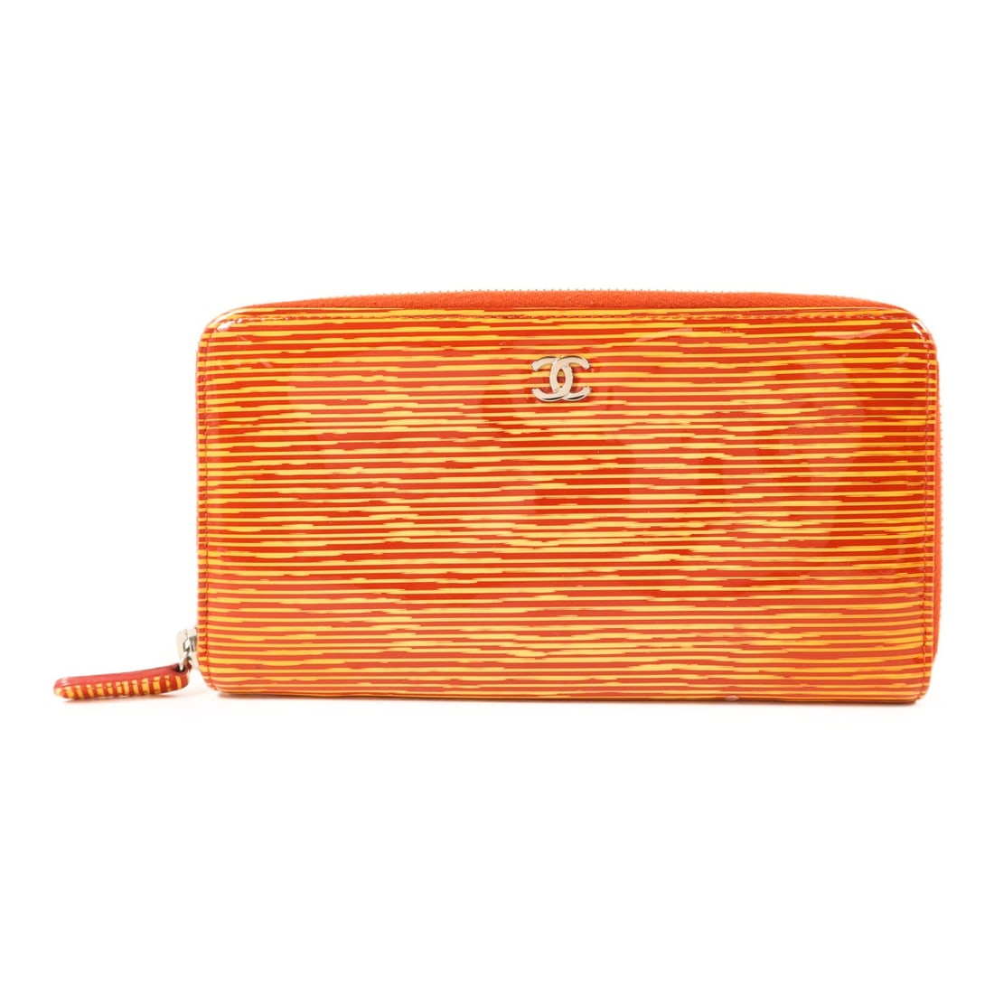 Chanel Patent Leather Orange Long Wallet with Silver Tone CC Logo: Chanel Patent Leather Orange Long Wallet with Silver Tone CC Logo This CHANEL long round wallet is crafted from orange patent leather, featuring the iconic CC logo and a secure zip-around design. Desi