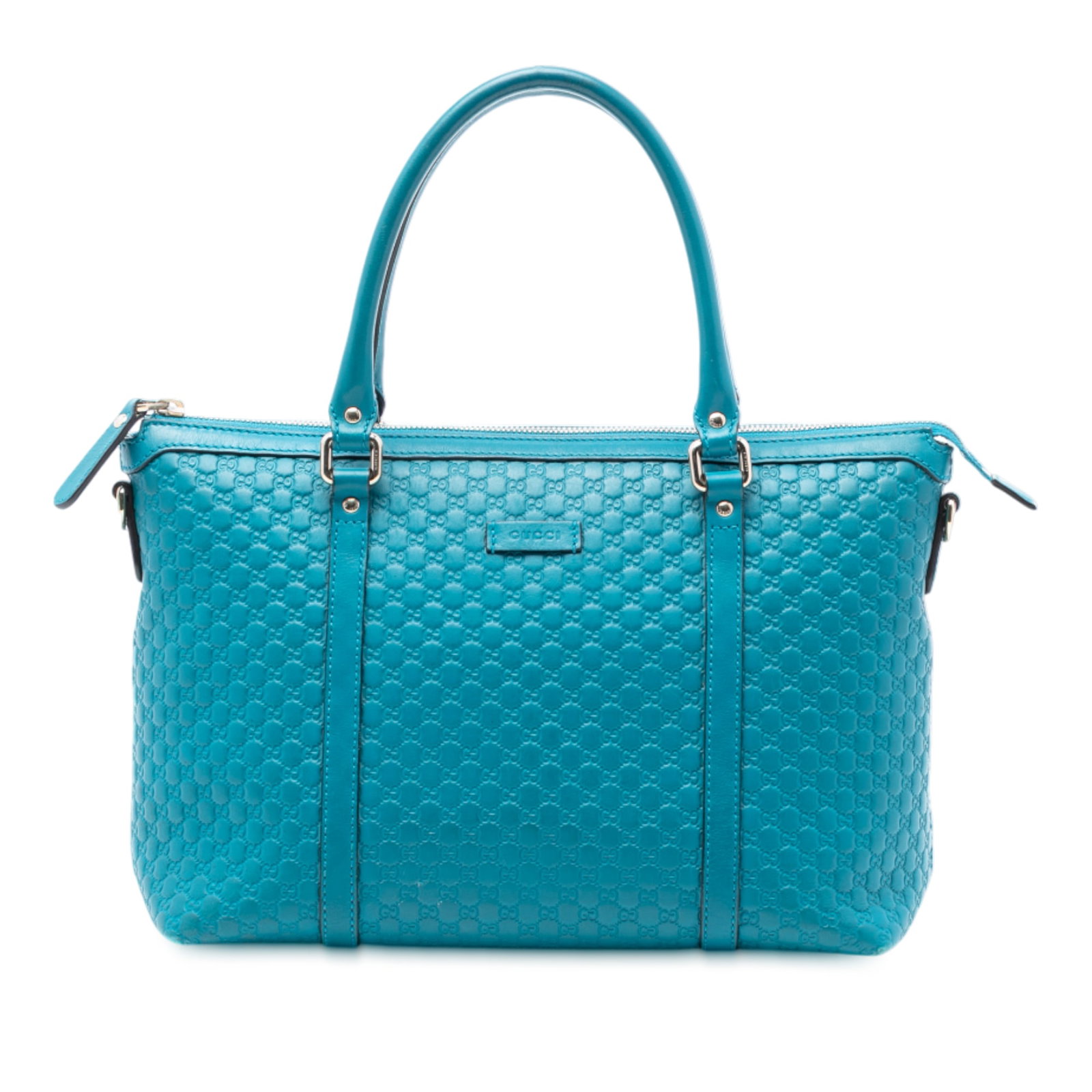 Blue Leather Small Joy Satchel Microguccissima by Gucci: Blue Leather Small Joy Satchel Microguccissima by Gucci This Gucci Small Microguccissima Joy Satchel features a blue leather body with rolled leather handles, a top zip closure, and both interior zip 