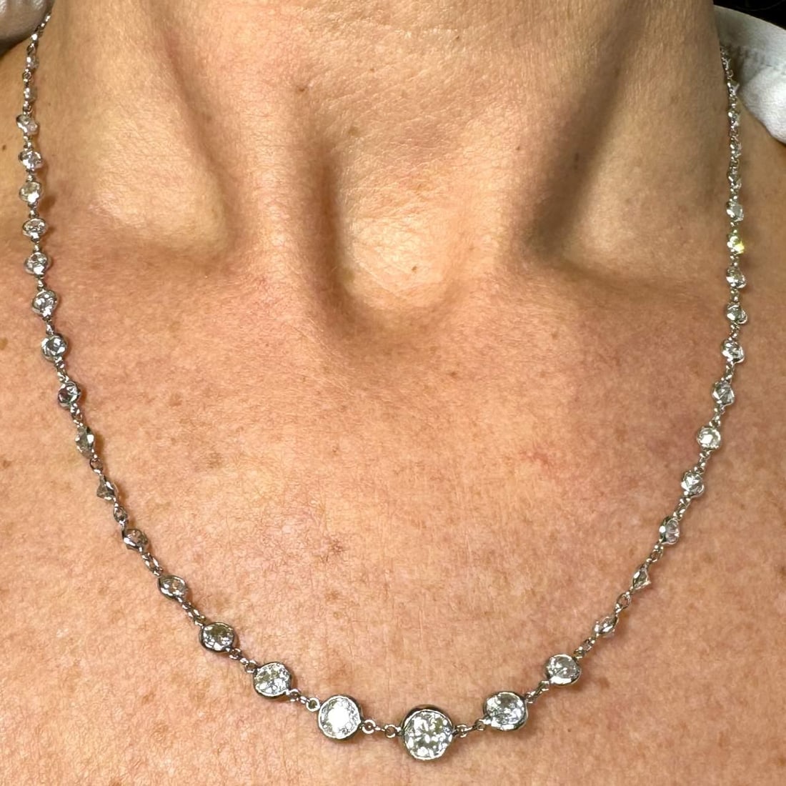 Platinum Graduated Diamond Necklace 11.25 Ct 58 Diamonds 18 Inch: Platinum Graduated Diamond Necklace 11.25 Ct 58 Diamonds 18 Inch This stunning graduated diamond by the yard necklace is crafted in platinum, featuring a total of 58 sparkling diamonds with an approxi