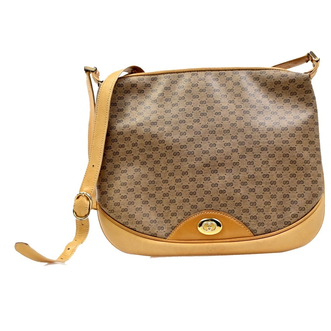 Vintage Gucci Brown GG Coated Canvas Shoulder Bag: Vintage Gucci Brown GG Coated Canvas Shoulder Bag This Gucci vintage shoulder bag features the iconic GG coated canvas in brown, designed for female use. The bag measures 30cm x 26cm x 3cm and is craf