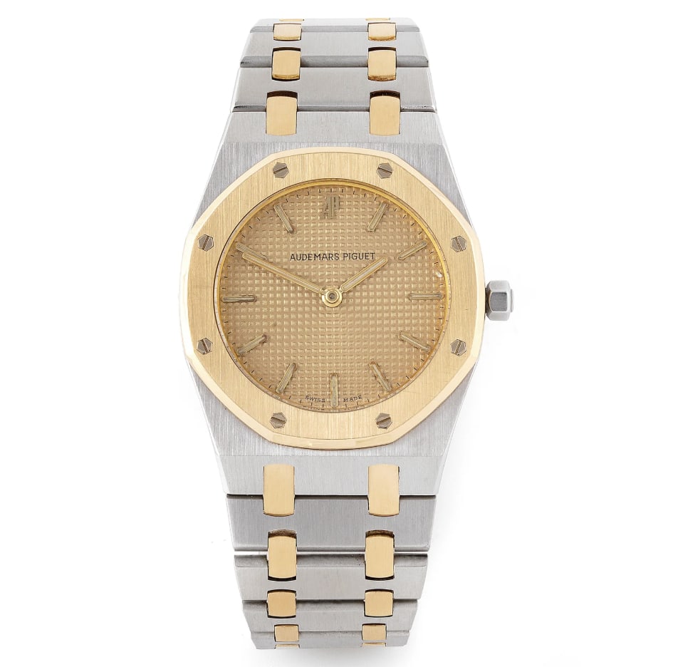Royal Oak Two Tone Bracelet Watch Ref 56303SA Champagne Tapisserie Dial: Royal Oak Two Tone Bracelet Watch Ref 56303SA Champagne Tapisserie Dial This Audemars Piguet Royal Oak watch features a distinctive champagne Tapisserie dial, complemented by a fixed bezel and a two-t