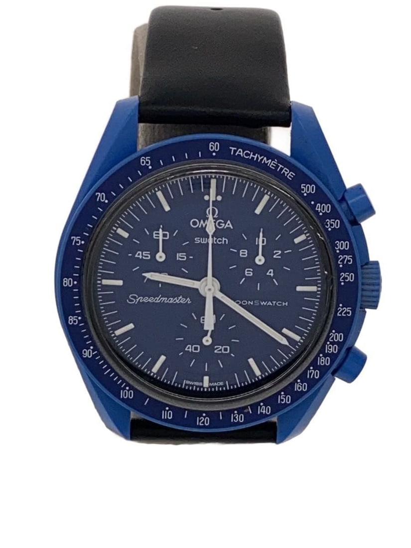 Omega x Swatch Neptune Blue Quartz Wristwatch: Omega x Swatch Neptune Blue Quartz Wristwatch This OMEGAxSWATCH Mission to Neptune men's wristwatch features a blue design and Swiss origin. It is a quartz watch in slightly used condition, offering a