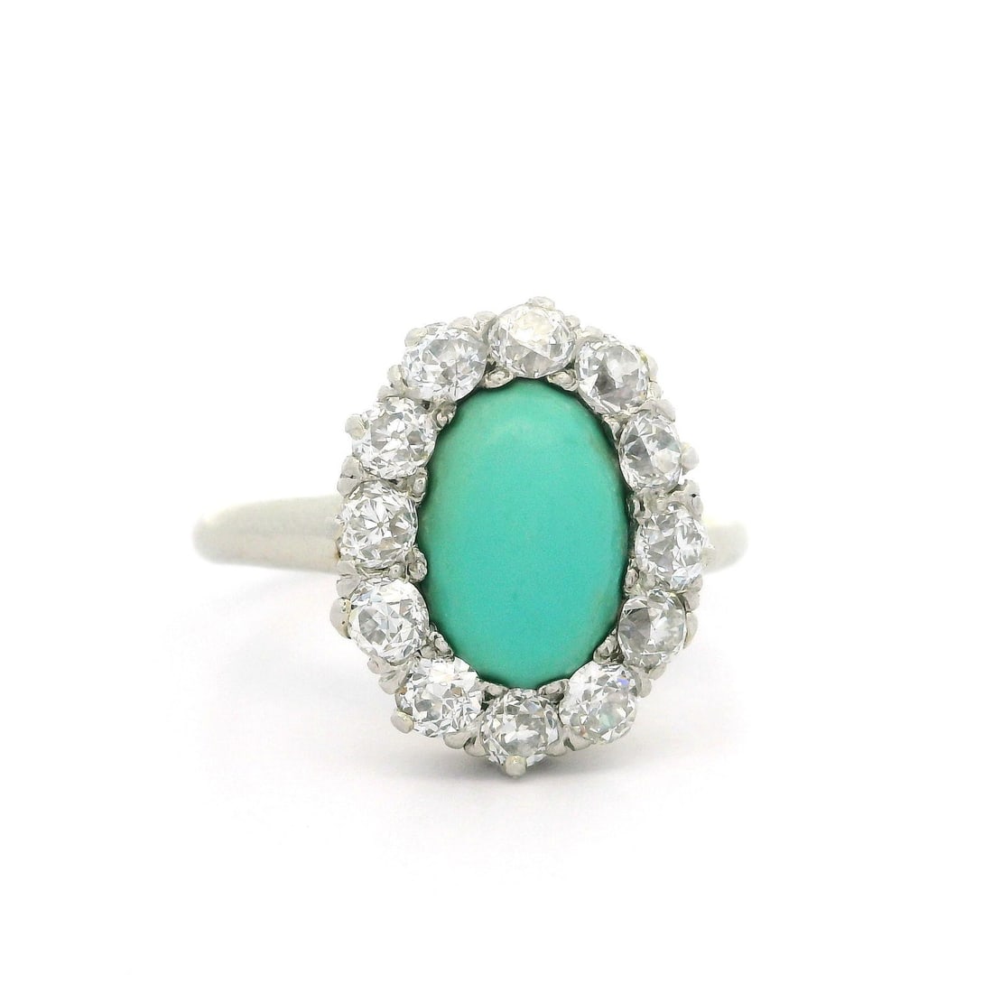 Antique Victorian 14k Gold Turquoise Diamond Halo Ring 0.70ctw: Antique Victorian 14k Gold Turquoise Diamond Halo Ring 0.70ctw Discover the exquisite beauty of this Antique Victorian Gold & Platinum Oval Turquoise Old Mine Cut Diamond Halo Ring. This stunning piec
