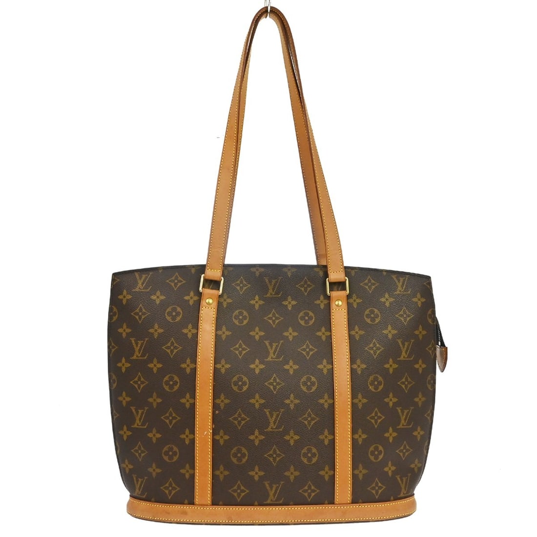 Louis Vuitton Babylone Brown Canvas Tote Bag: Louis Vuitton Babylone Brown Canvas Tote Bag This Louis Vuitton Babylone Handbag features the iconic Monogram Canvas in brown, designed for women. The bag is crafted in France and showcases the classi