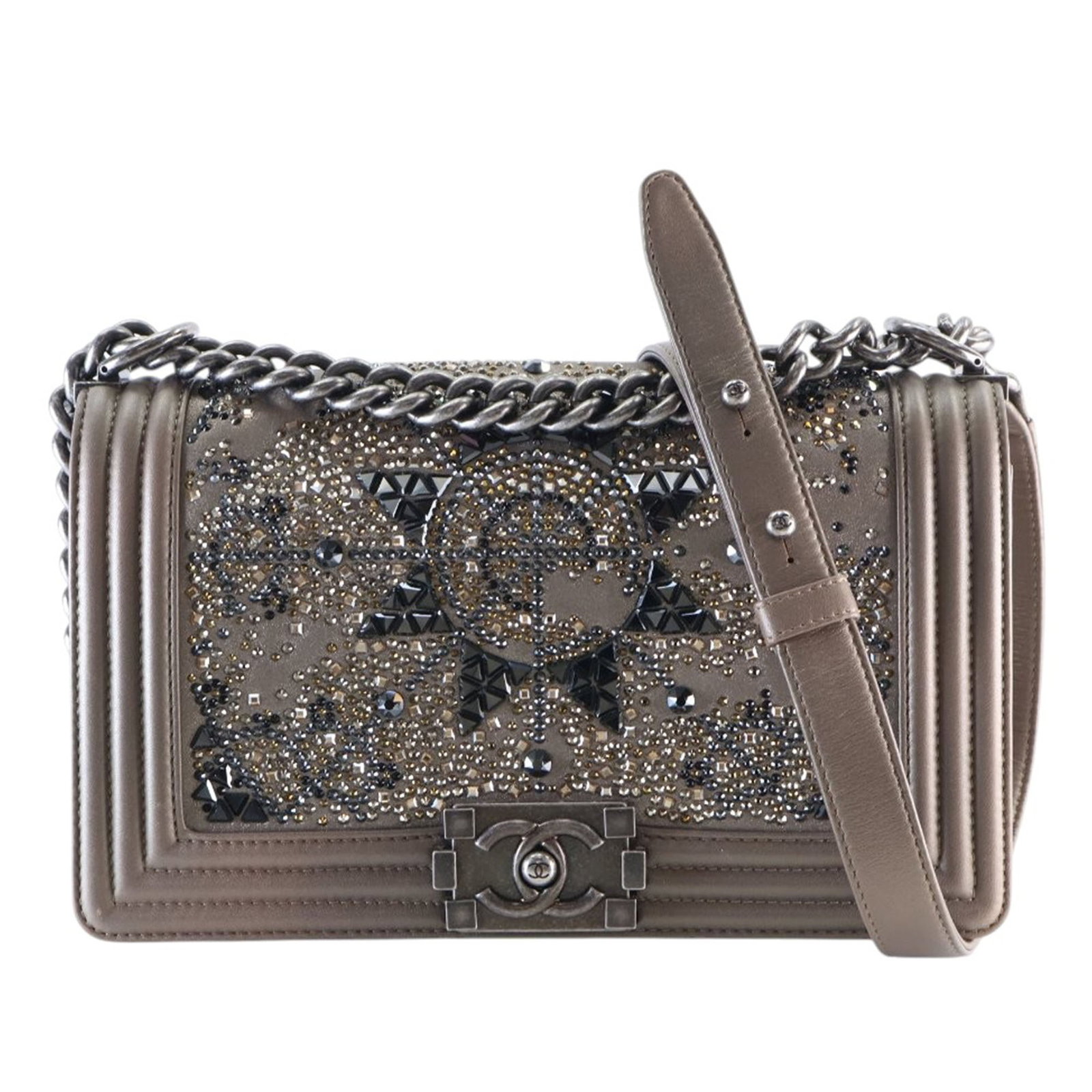 Chanel Boy Flap Bag Metallic Goatskin Crystal Brown: Chanel Boy Flap Bag Metallic Goatskin Crystal Brown This Chanel Old Medium Metallic Goatskin Crystal Boy Flap bag is crafted from goatskin leather with striking crystal embellishments. It features a f