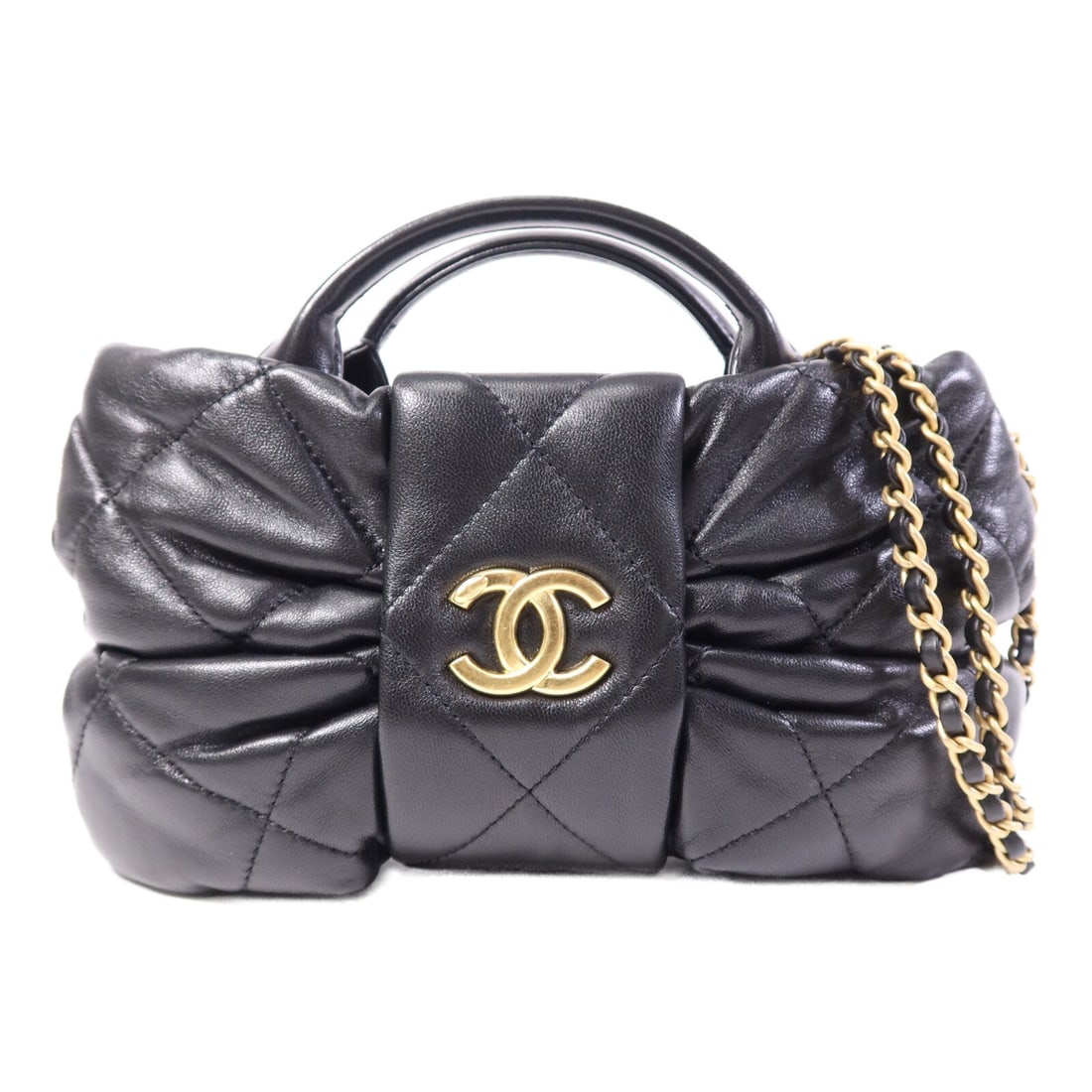 Black Lambskin Leather Shoulder Bag by CHANEL CC with Gold Hardware: Black Lambskin Leather Shoulder Bag by CHANEL CC with Gold Hardware This CHANEL shoulder bag is crafted from black lambskin leather and features the signature CC design with chain detailing. Designed 