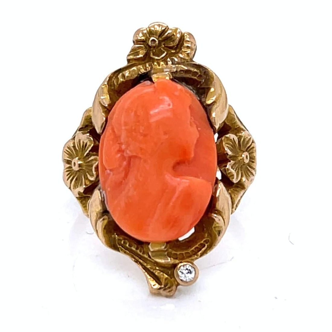 Art Nouveau 14K Gold Coral Diamond Ring Vintage Elegance: Art Nouveau 14K Gold Coral Diamond Ring Vintage Elegance This stunning Art Nouveau ring features exquisite 14K yellow gold, showcasing a beautifully carved coral centerpiece accented by a sparkling 0.