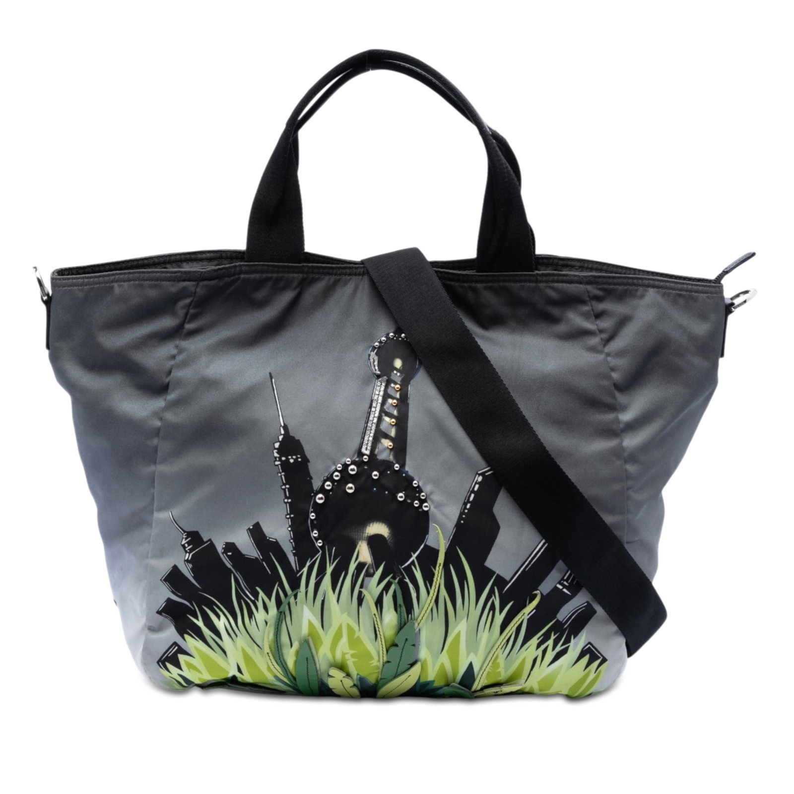 Prada Tessuto Jungle Print Nylon Tote Bag: Prada Tessuto Jungle Print Nylon Tote Bag This Prada Tessuto City and Jungle Print Tote showcases a striking printed nylon body adorned with bead and leather applique embellishments. Designed for vers