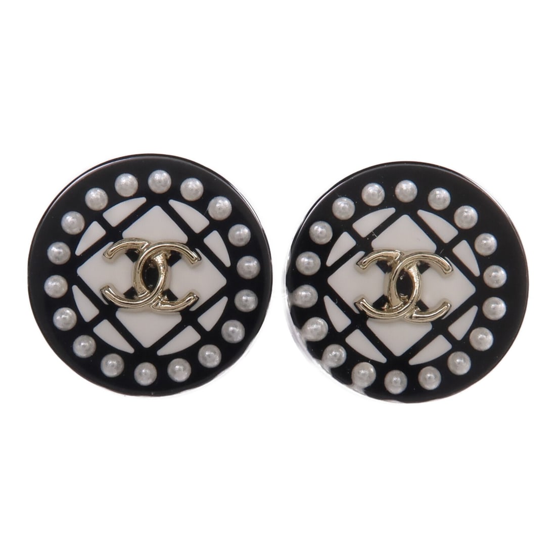 Chanel Black and White CC Logo Pierced Earrings in PVC and Metal: Chanel Black and White CC Logo Pierced Earrings in PVC and Metal These CHANEL CC earrings feature a distinctive black and white design crafted from PVC and metal materials. Designed for pierced ears, 