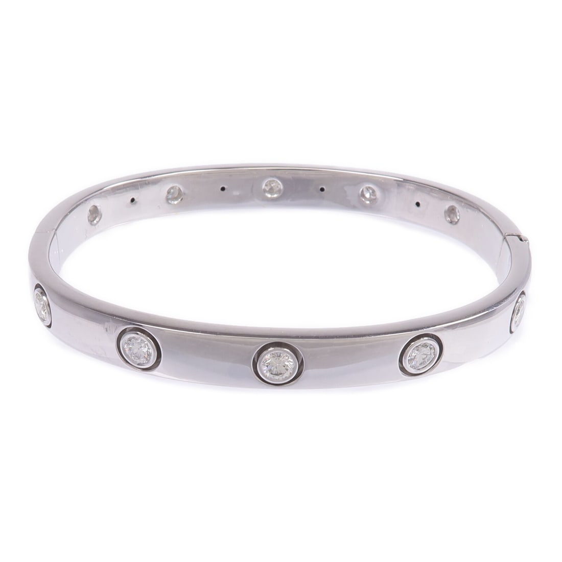 18K White Gold Diamond Bangle Style Bracelet: 18K White Gold Diamond Bangle Style Bracelet This diamond bangle bracelet is crafted from 18K white gold and features clear diamonds as the main stones. The bracelet is in very good, un-used condition