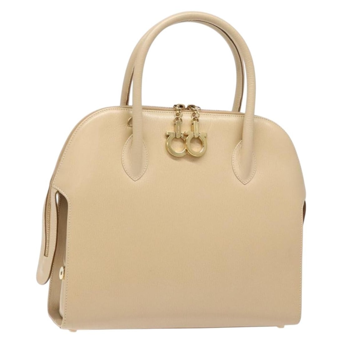 Salvatore Ferragamo Gancini leather ivory gold handbag Italy 11in: Salvatore Ferragamo Gancini leather ivory gold handbag Italy 11in This Salvatore Ferragamo Gancini hand bag is crafted from leather in an elegant ivory and gold color combination. Made in Italy, it fe