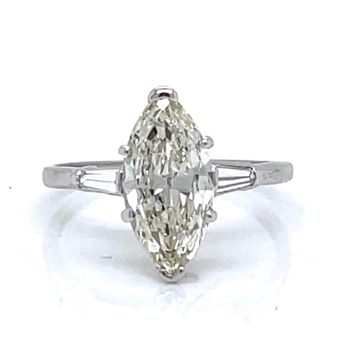 1950s Platinum Diamond Ring 2.05 Ct Marquise K VVS Clarity: 1950s Platinum Diamond Ring 2.05 Ct Marquise K VVS Clarity This exquisite 1950's platinum ring showcases a stunning 2.05 Ct. marquise diamond, with K color and VVS clarity, making it a true statement 