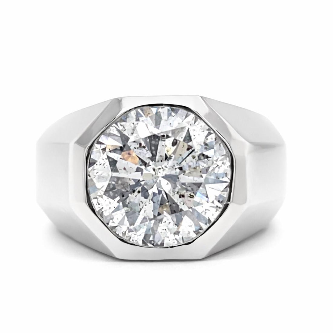 Platinum Ring with 4.73 Carat GIA Round Diamond H I2: Platinum Ring with 4.73 Carat GIA Round Diamond H I2 This platinum ring features a 4.73 carat round diamond that is GIA certified, with H color and I2 clarity. The ring weighs 29.8 grams and is a size